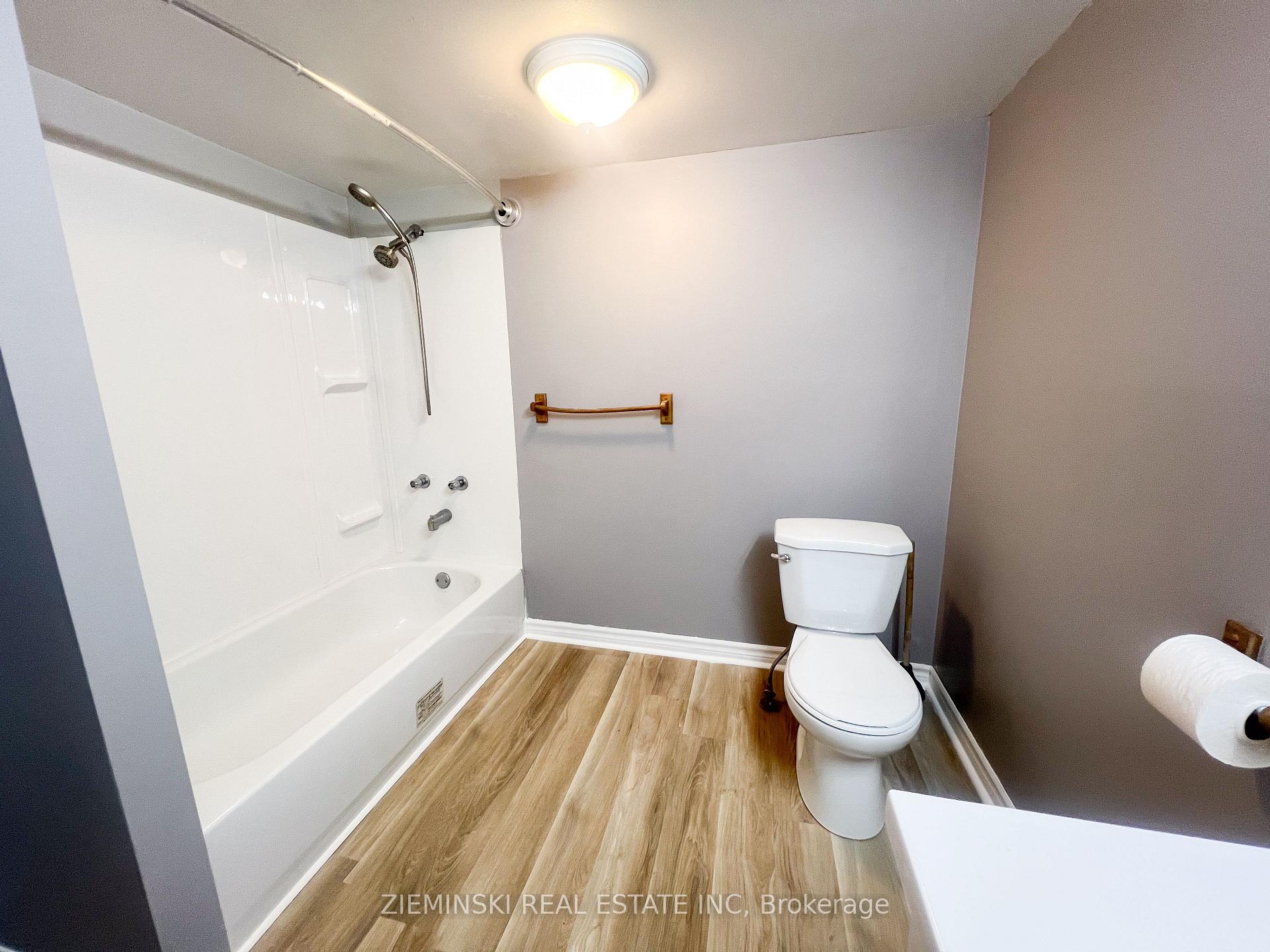 Photo 16 of Unit A, 15 Fourth Street, Cochrane — HOMEH