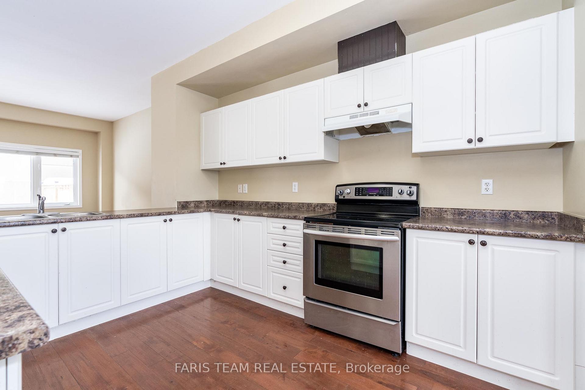 Photo 4 of Unit 8, 175 Stanley Street, Barrie, East Bayfield — HOMEH