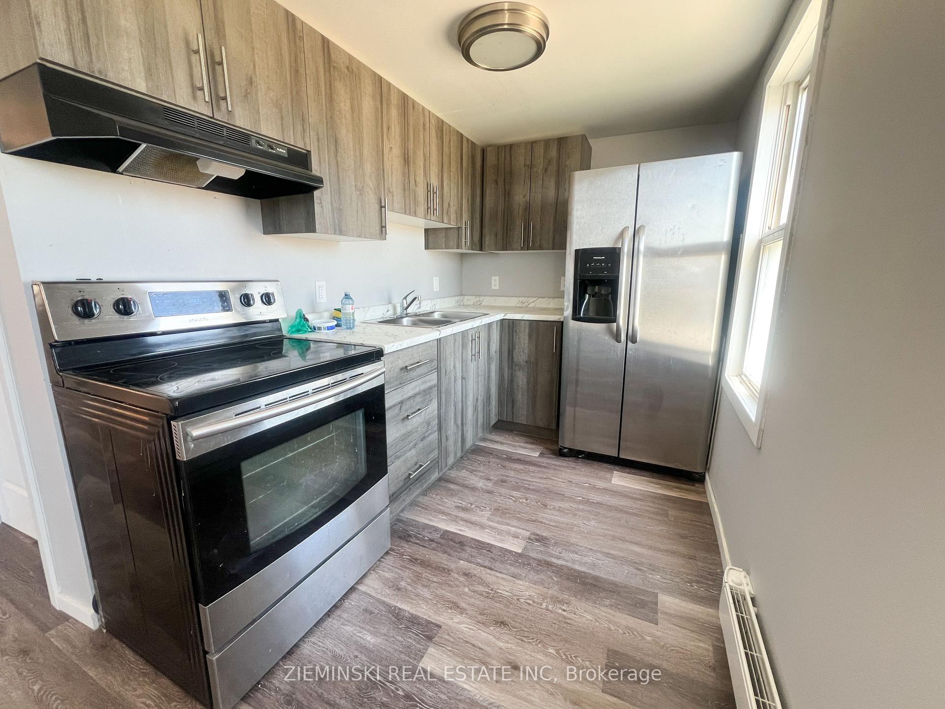 Photo 6 of Unit B, 15 Fourth Street, Cochrane — HOMEH