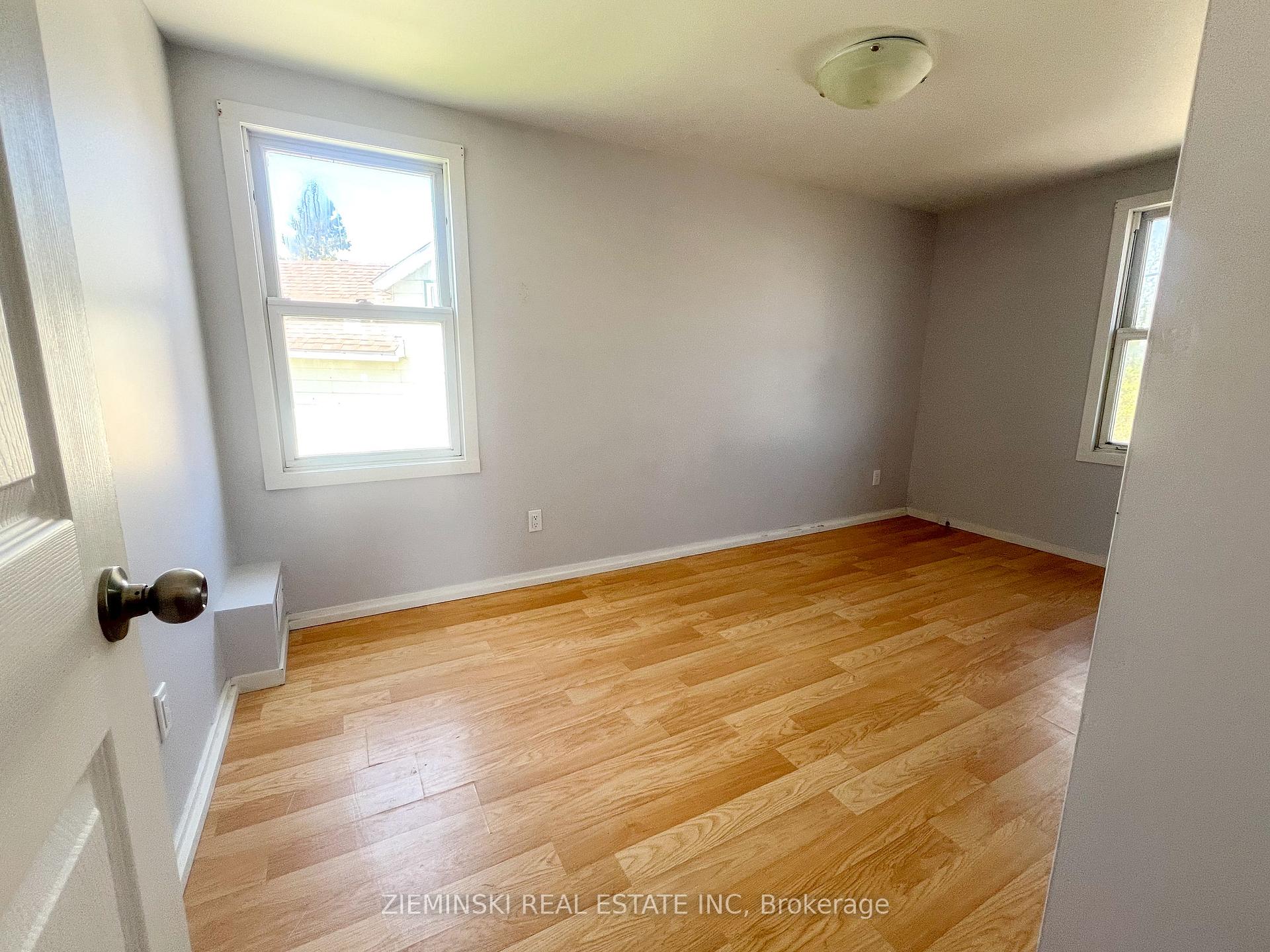 Photo 15 of Unit B, 15 Fourth Street, Cochrane — HOMEH