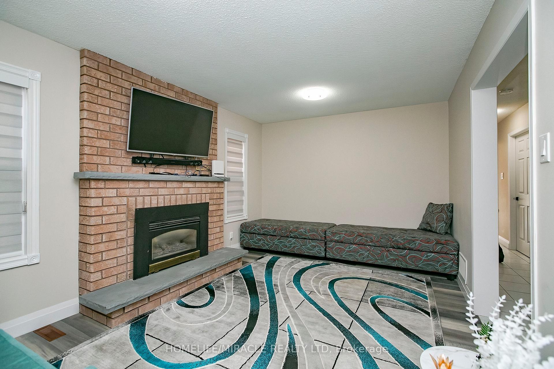 Photo 7 of 107 Michigan Avenue, Brampton, Fletcher's Creek South — HOMEH