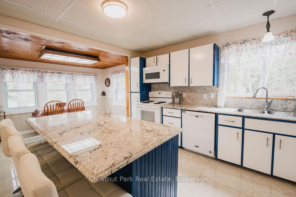 Photo 19 of 6131 Highway 11 N, Temagami — HOMEH