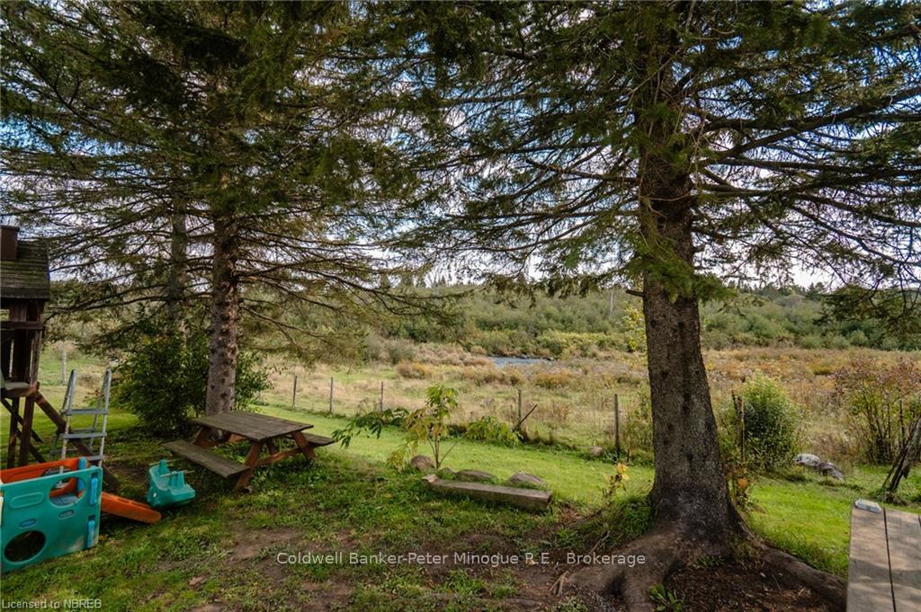 Photo 35 of 2034 Village Road, Chisholm — HOMEH