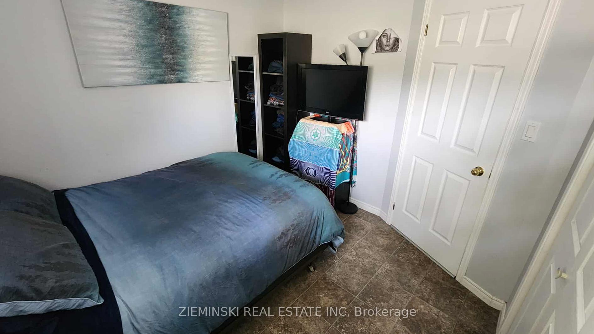 Photo 30 of 447 Eleventh Avenue, Cochrane — HOMEH