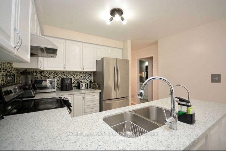 Photo 9 of 126 Edenbrook Hill Drive, Brampton, Fletcher's Meadow — HOMEH