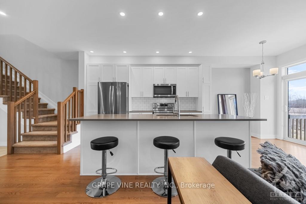 Photo 8 of 653 Putney Crescent, Ottawa, Stittsville (South) — HOMEH