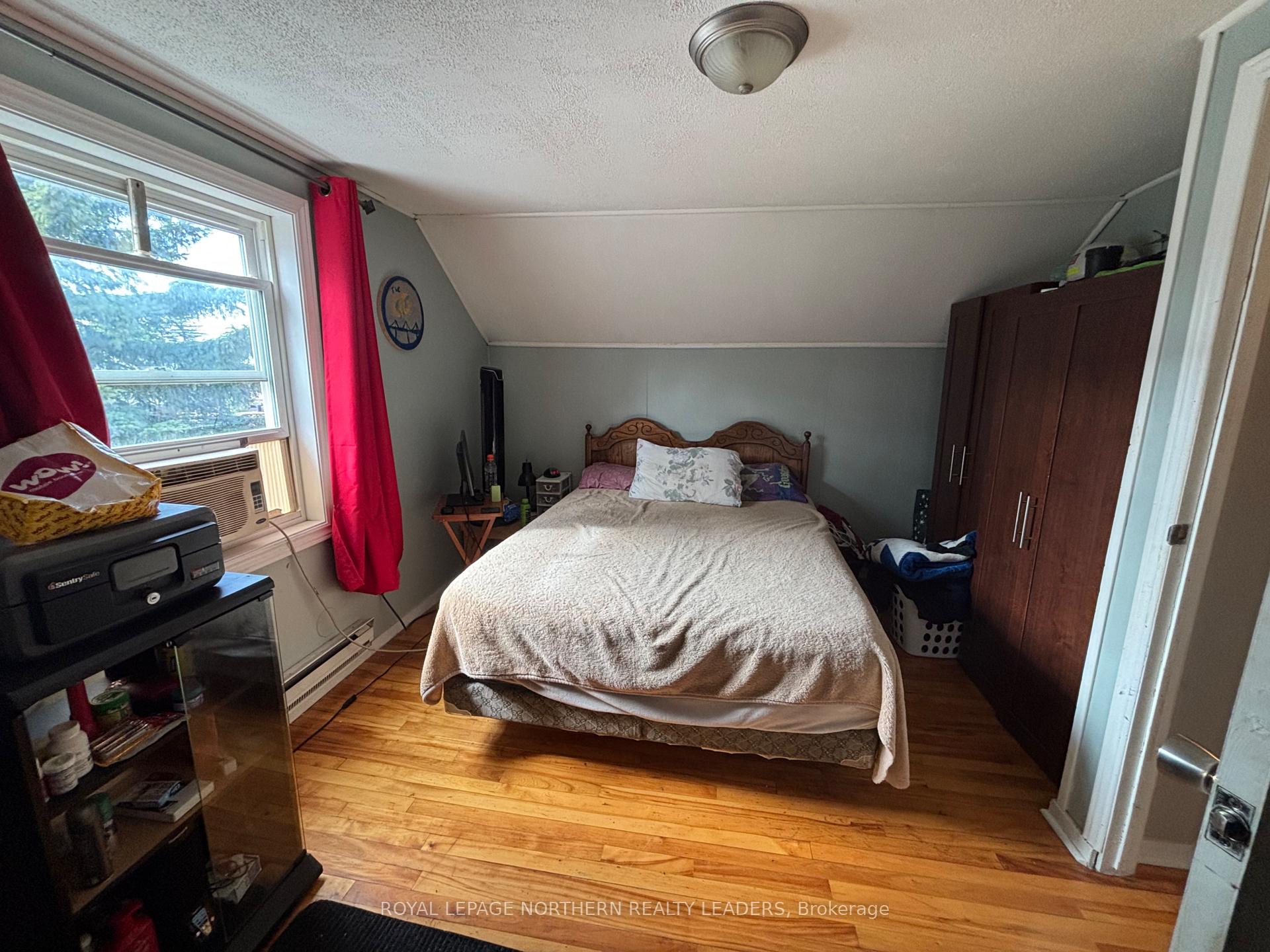 Photo 23 of 124 Fourteenth Avenue, Cochrane — HOMEH