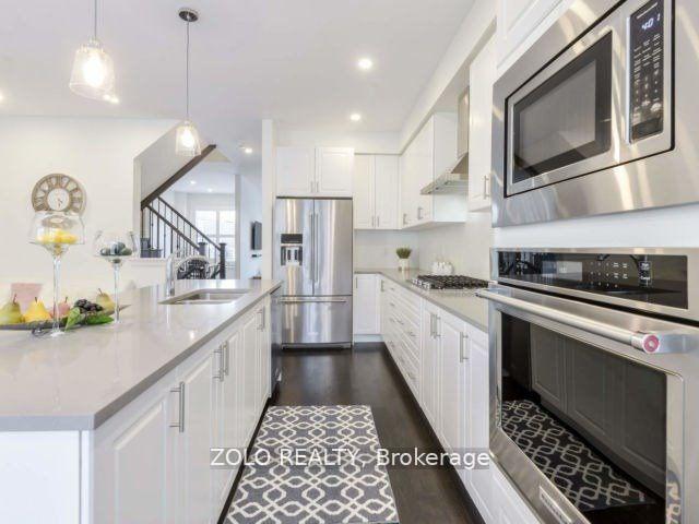 Photo 1 of 10 Brushwood Drive, Brampton, Bram West — HOMEH