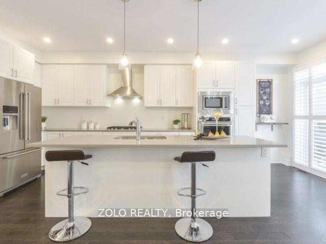 Photo 3 of 10 Brushwood Drive, Brampton, Bram West — HOMEH