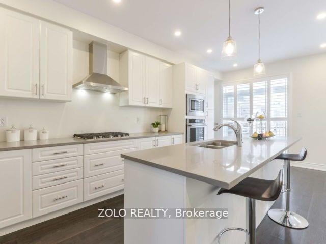 Photo 4 of 10 Brushwood Drive, Brampton, Bram West — HOMEH