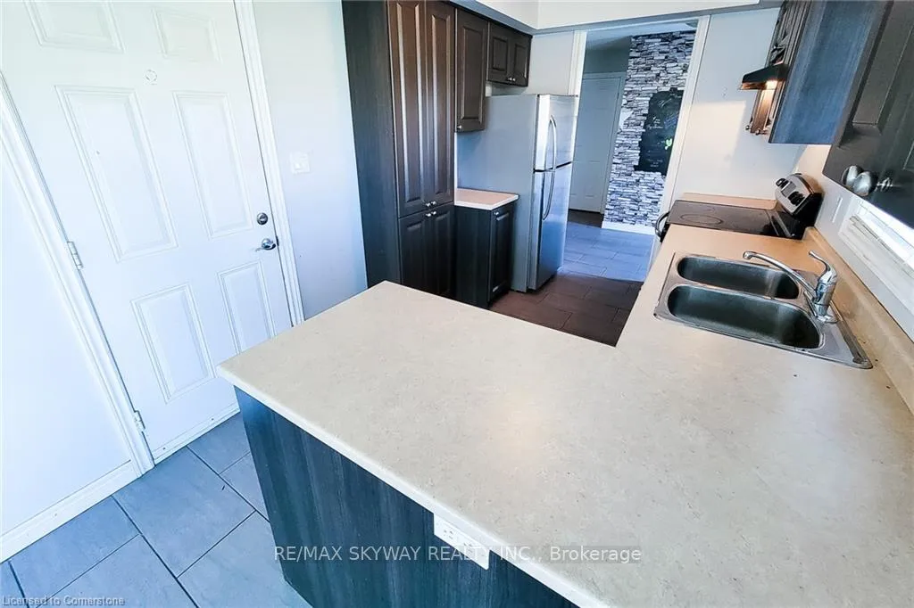Photo 5 of Unit 49, 20 Mcconkey Crescent, Brantford — HOMEH