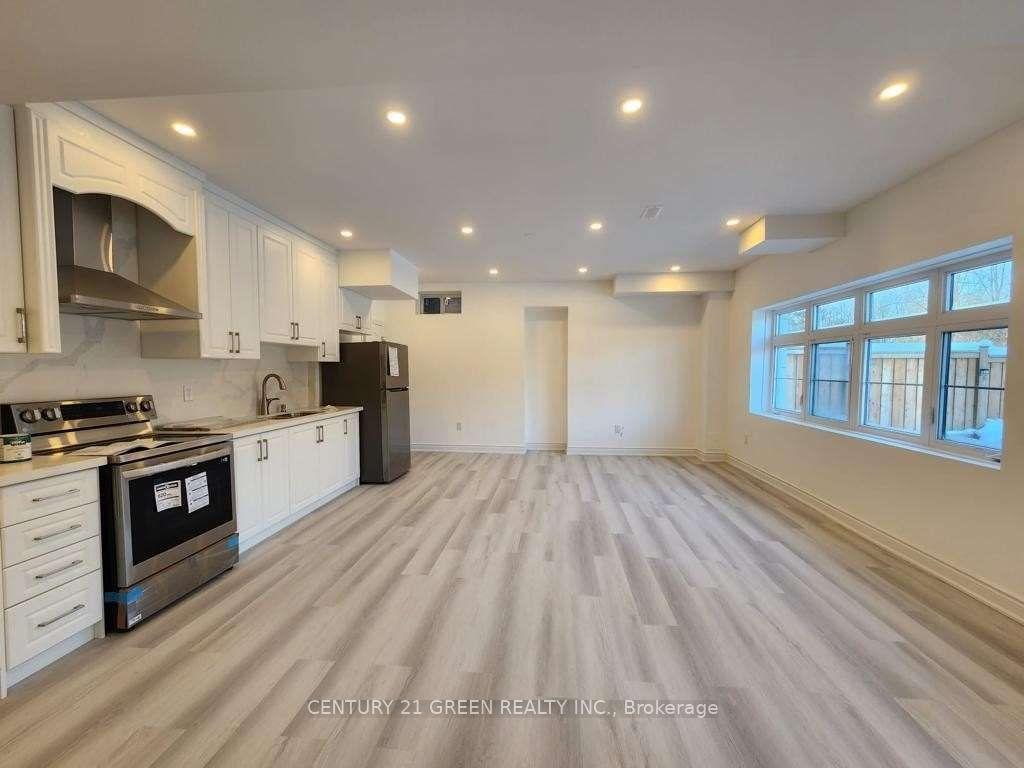 Photo 5 of Unit Bsmt, 66 Malaspina Close, Brampton, Bram West — HOMEH
