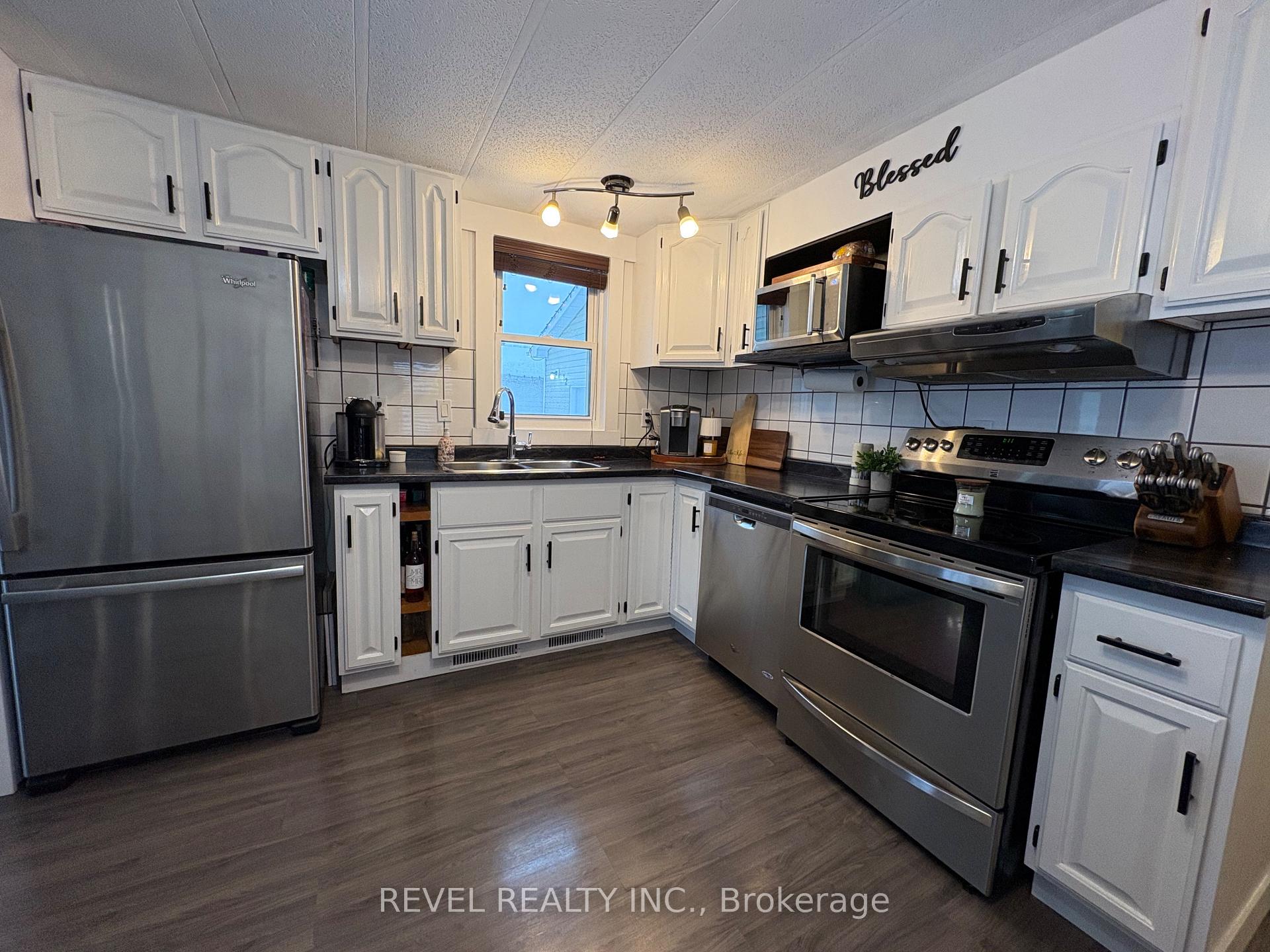 Photo 10 of 12 Ford Street, Cochrane — HOMEH