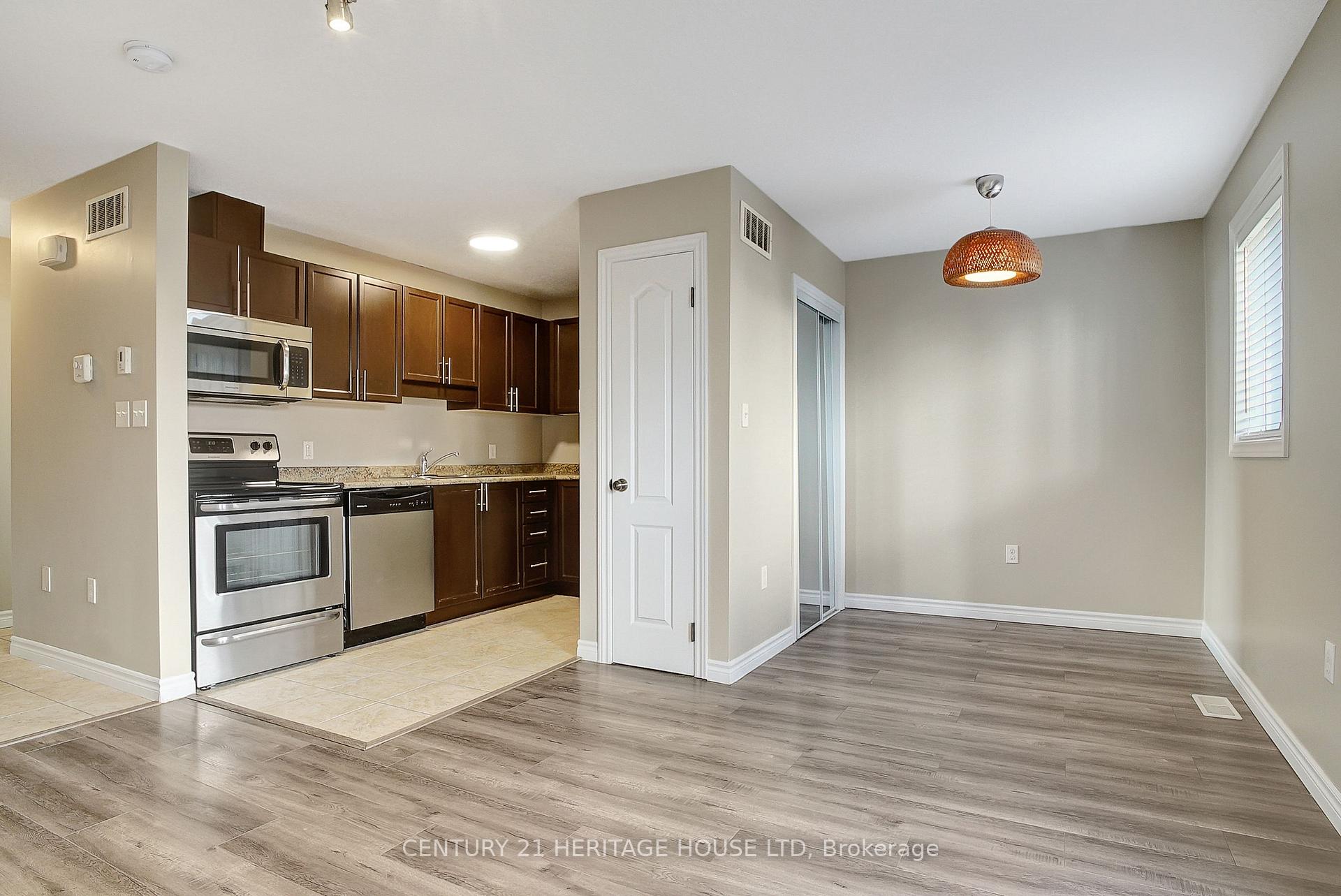 Photo 11 of Unit 11A, 55 Mooregate Crescent, Kitchener — HOMEH