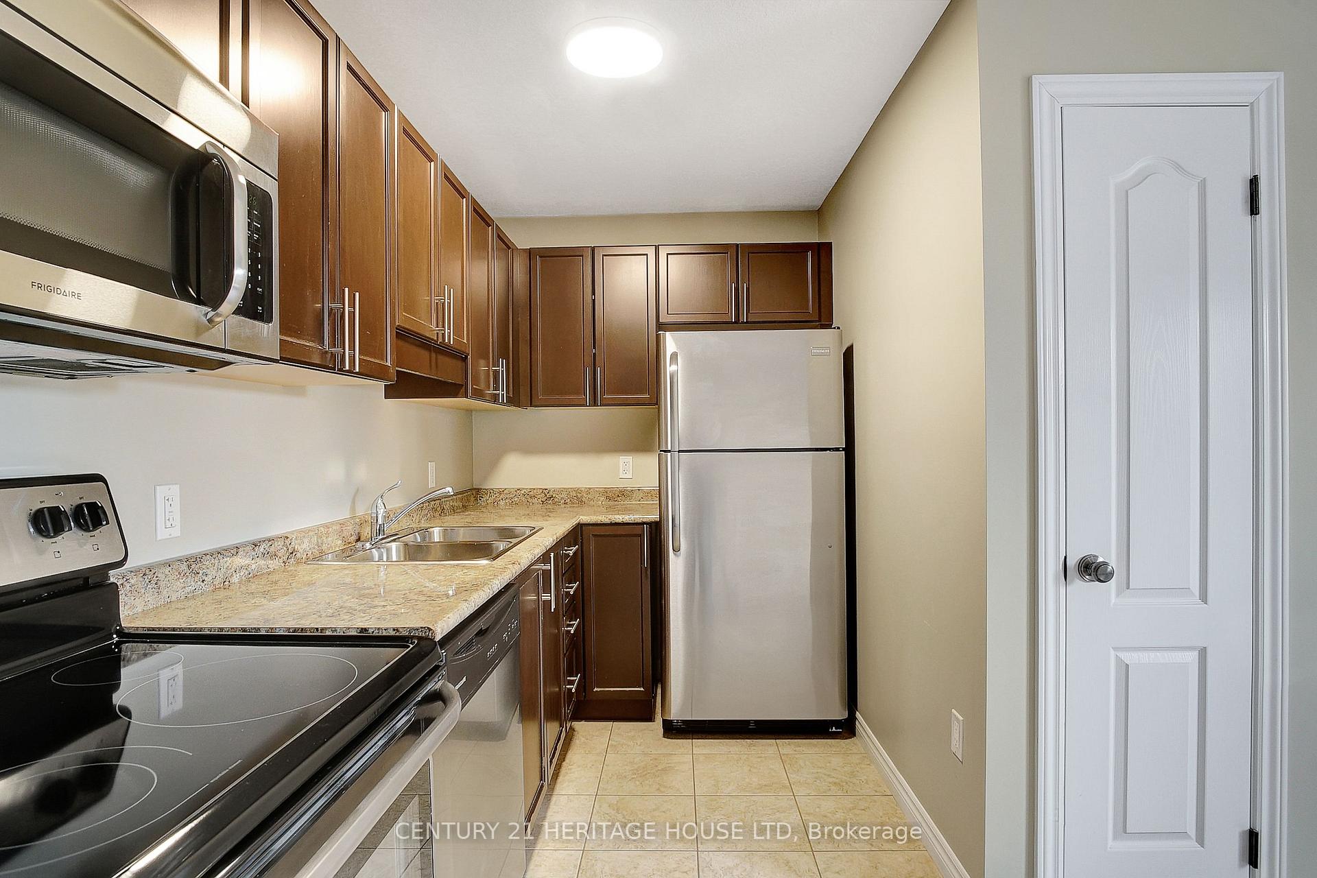 Photo 16 of Unit 11A, 55 Mooregate Crescent, Kitchener — HOMEH