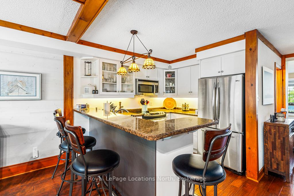 Photo 8 of Unit 7, 139 Lakeshore Road E, Blue Mountains — HOMEH