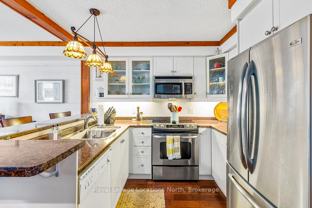 Photo 9 of Unit 7, 139 Lakeshore Road E, Blue Mountains — HOMEH