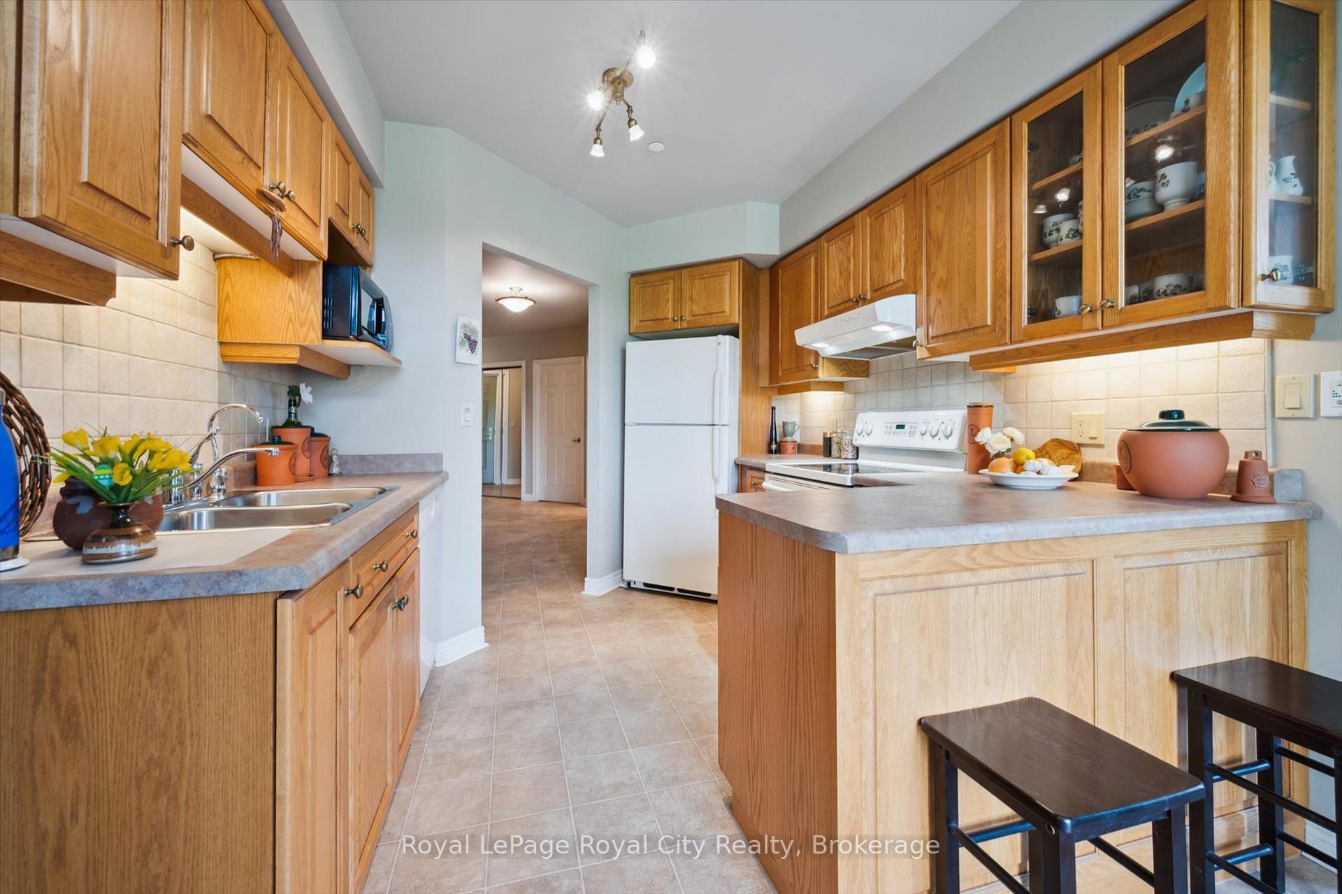 Photo 39 of Unit 112, 71 Bayberry Drive, Guelph, Village By The Arboretum — HOMEH