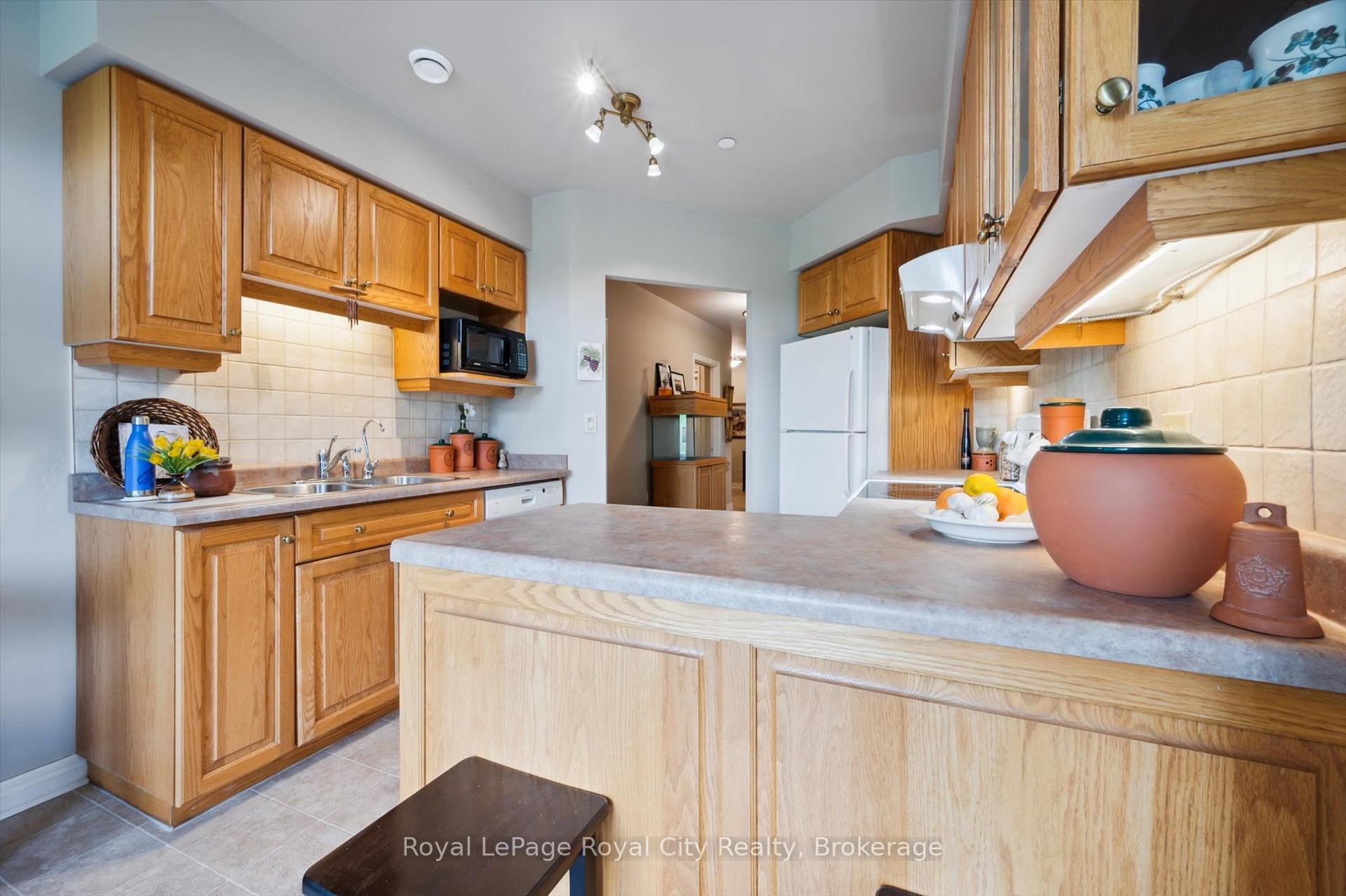 Photo 40 of Unit 112, 71 Bayberry Drive, Guelph, Village By The Arboretum — HOMEH