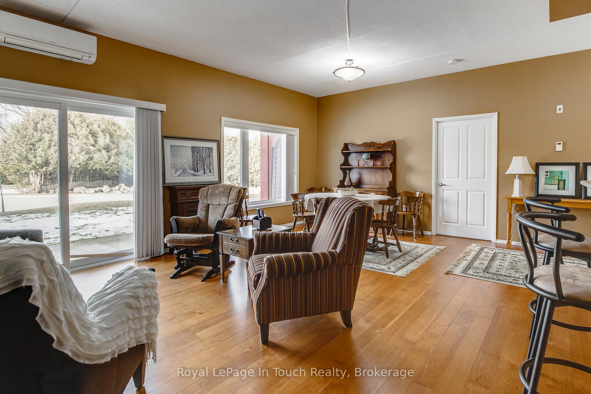 Photo 3 of Unit 104, 333 Lafontaine Road W, Tiny, Rural Tiny — HOMEH