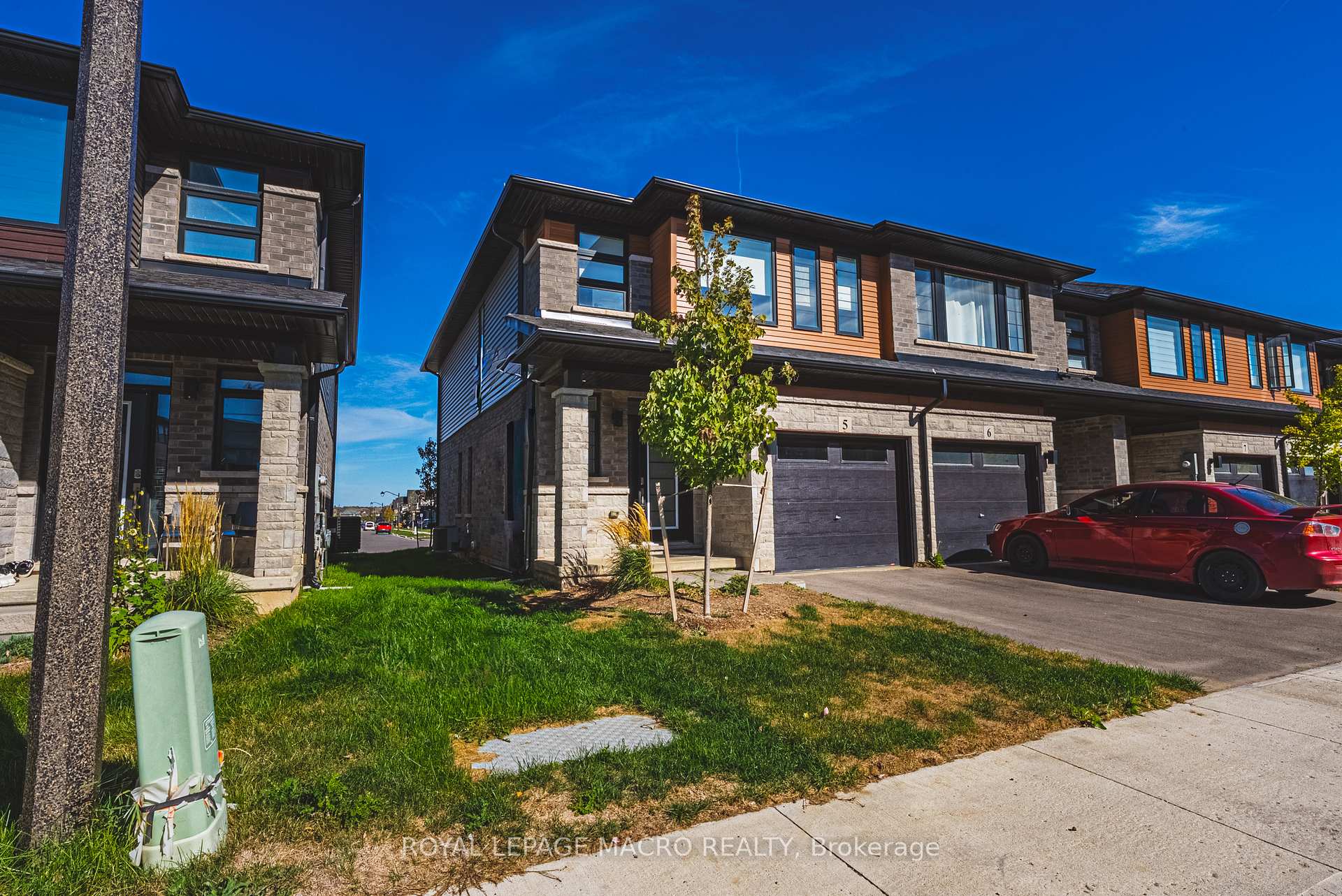 Photo 5 of Unit 5, 461 Blackburn Drive, Brantford — HOMEH
