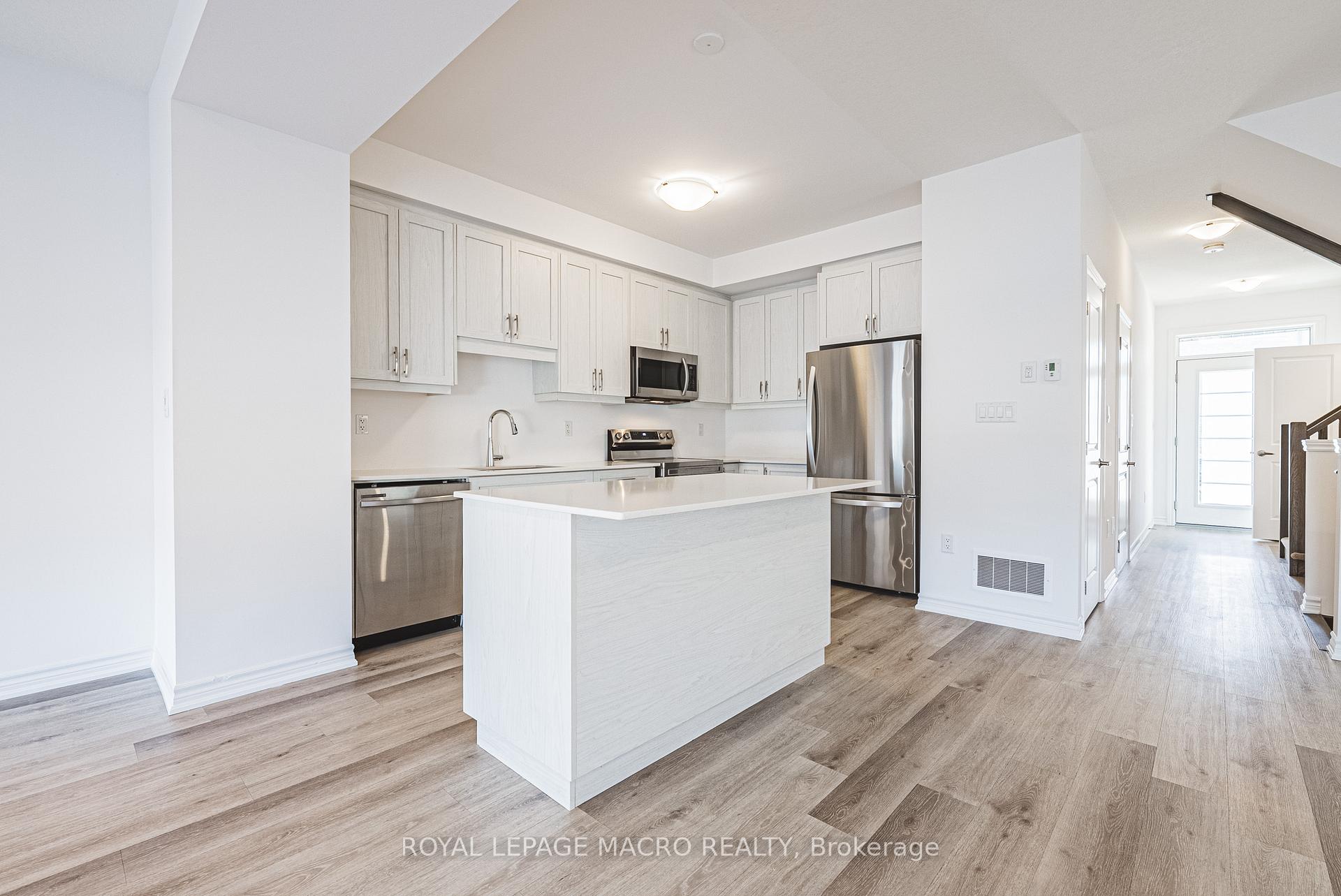Photo 12 of Unit 5, 461 Blackburn Drive, Brantford — HOMEH