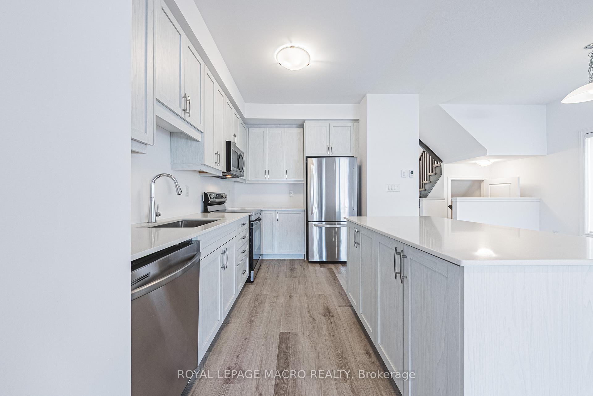 Photo 15 of Unit 5, 461 Blackburn Drive, Brantford — HOMEH