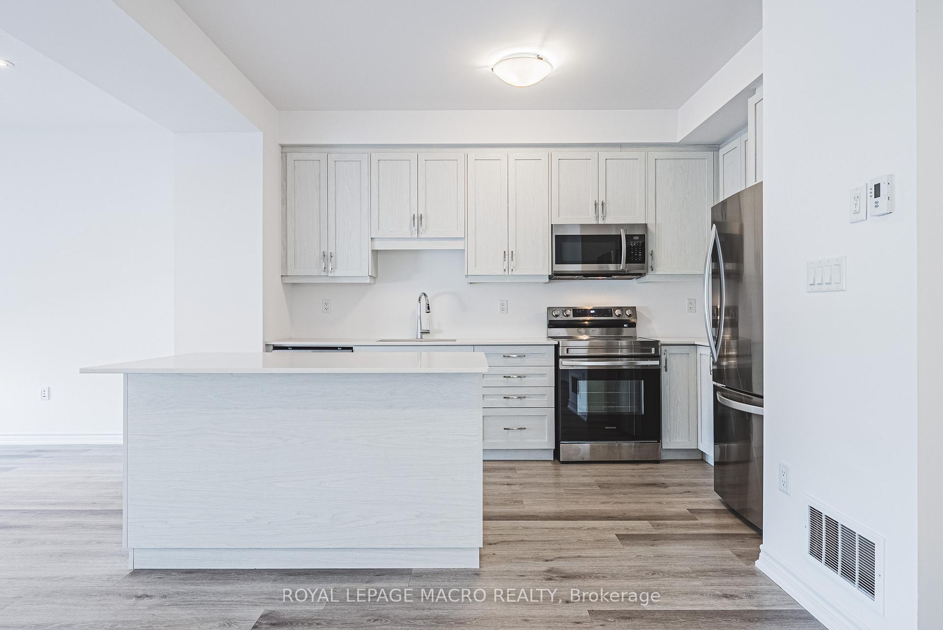 Photo 17 of Unit 5, 461 Blackburn Drive, Brantford — HOMEH