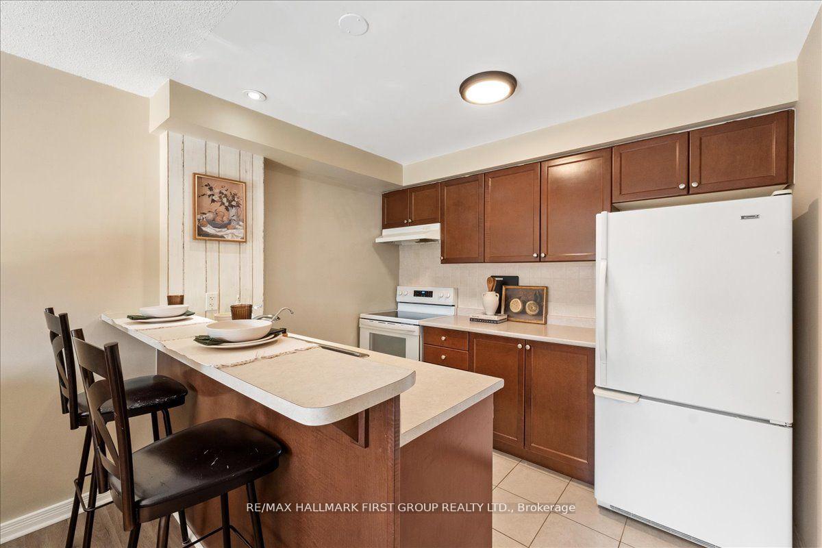 Photo 6 of Unit 204, 132 Aspen Springs Drive, Clarington, Bowmanville — HOMEH