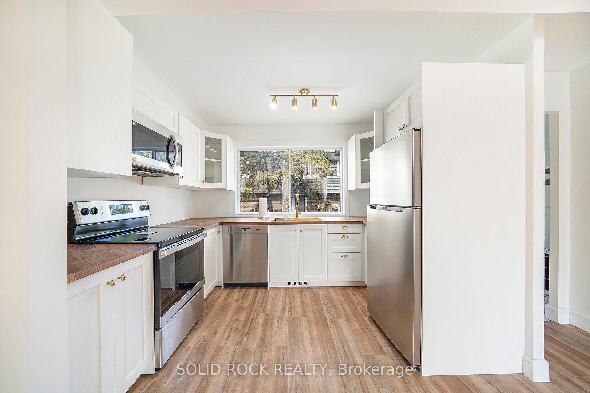 Photo 7 of Unit 1, 1641 Heatherington Road, Ottawa, Heron Gate/Industrial Park — HOMEH