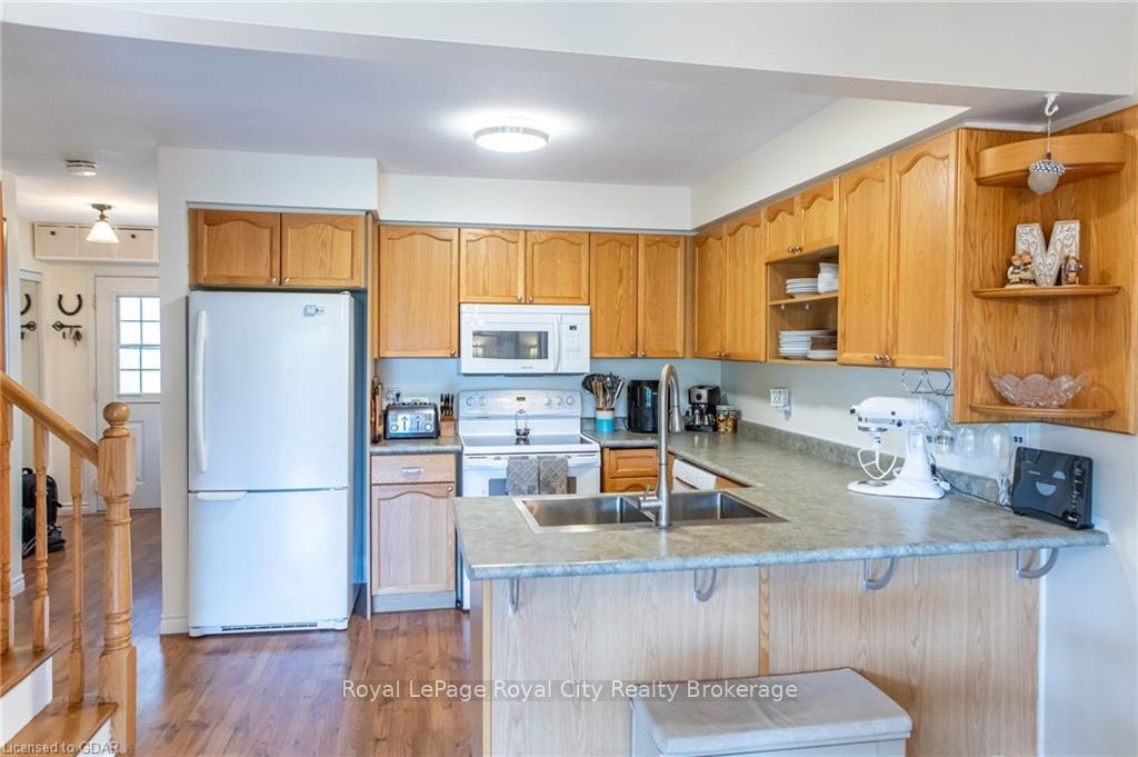 Photo 6 of Unit 14, 31 Schroder Crescent, Guelph, Grange Road — HOMEH