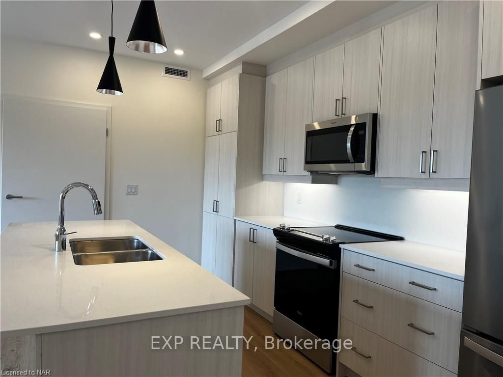 Photo 8 of Unit 306, 119 Lincoln Street, Welland, Broadway — HOMEH