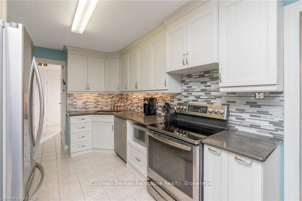 Photo 7 of Unit 50, 30 Green Valley Drive, Kitchener, Pioneer Park — HOMEH