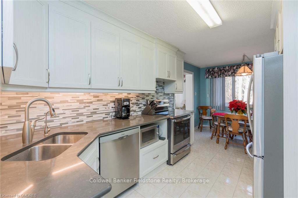 Photo 9 of Unit 50, 30 Green Valley Drive, Kitchener, Pioneer Park — HOMEH