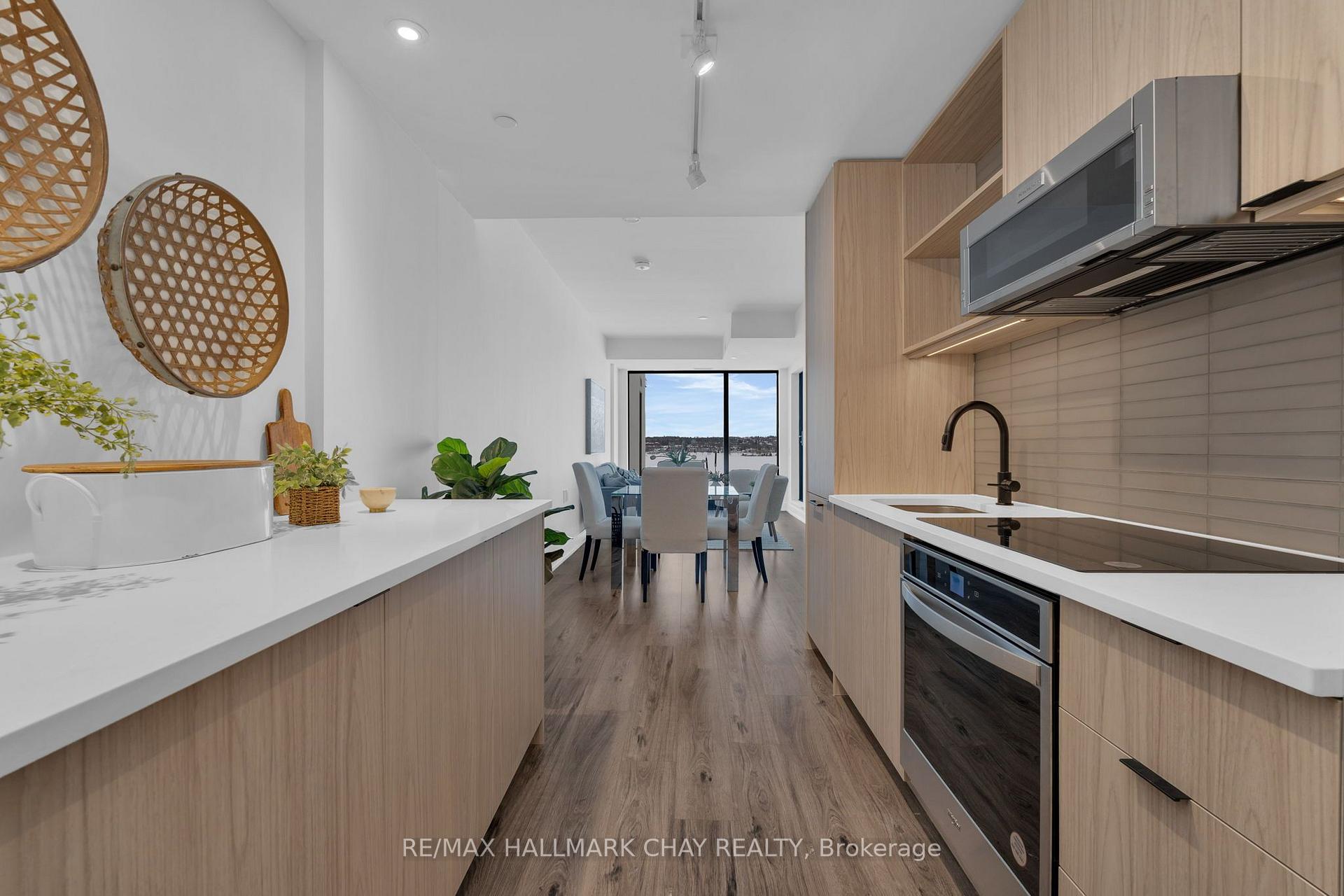 Photo 6 of Unit 810, 185 Dunlop Street E, Barrie, Lakeshore — HOMEH