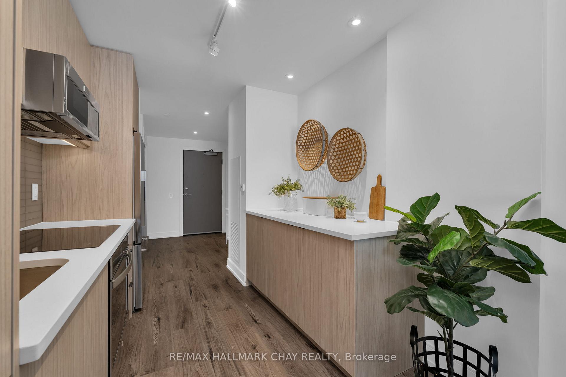Photo 7 of Unit 810, 185 Dunlop Street E, Barrie, Lakeshore — HOMEH