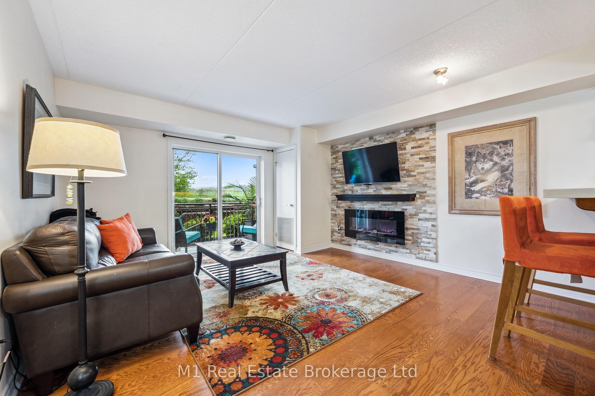 Photo 1 of Unit 105, 19 Waterford Drive, Guelph, Pineridge/Westminster Woods — HOMEH