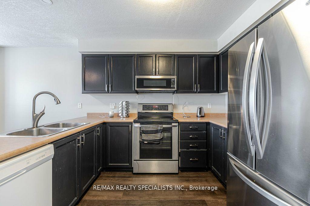 Photo 3 of Unit 8A, 50 Howe Drive, Kitchener — HOMEH