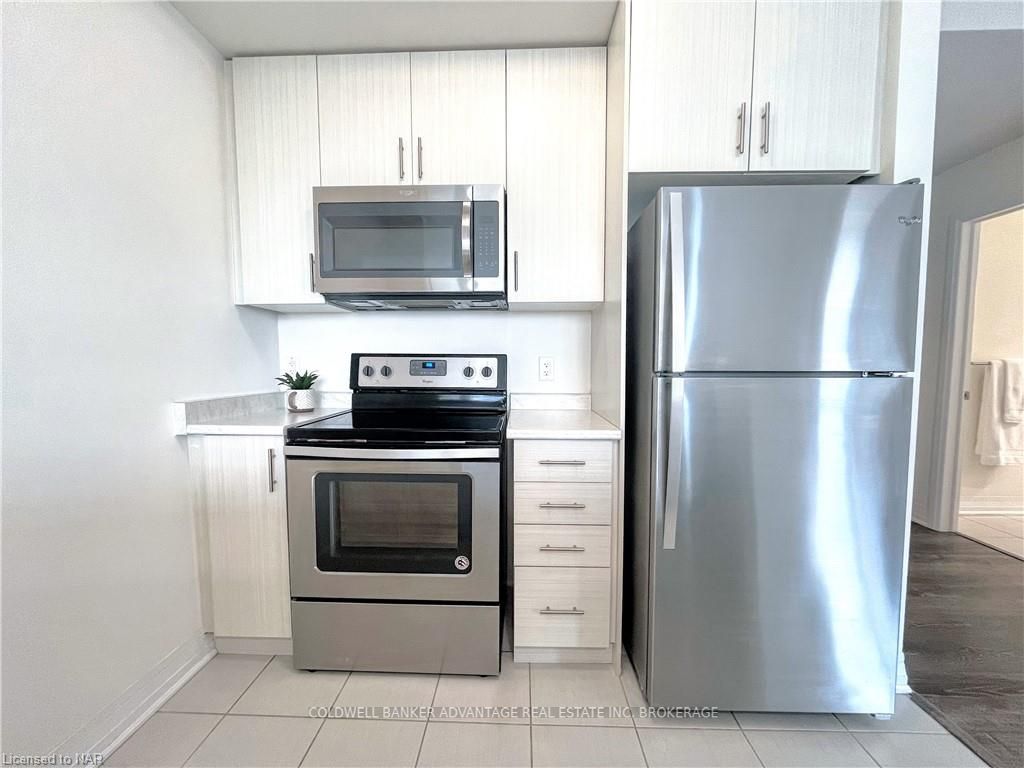 Photo 13 of Unit 403, 10 Concord Place, Grimsby, Grimsby Beach — HOMEH