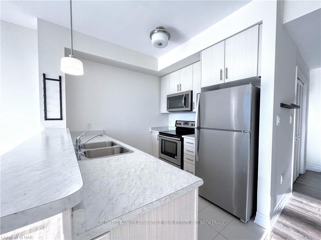 Photo 12 of Unit 403, 10 Concord Place, Grimsby, Grimsby Beach — HOMEH