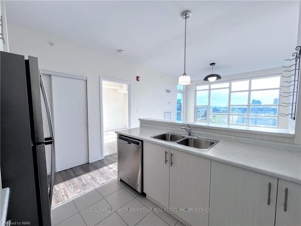 Photo 17 of Unit 403, 10 Concord Place, Grimsby, Grimsby Beach — HOMEH