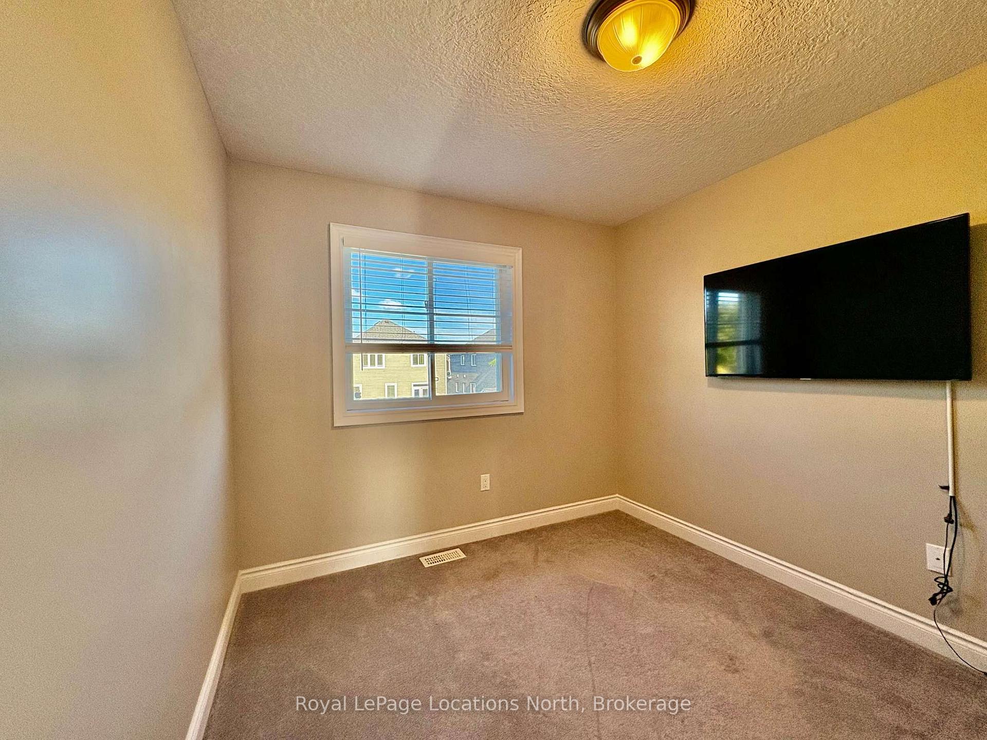 Photo 10 of 74 Garbutt Crescent, Collingwood — HOMEH