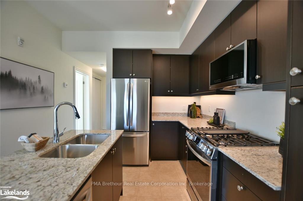Photo 29 of Unit 409, 17 Spooner Crescent, Collingwood — HOMEH