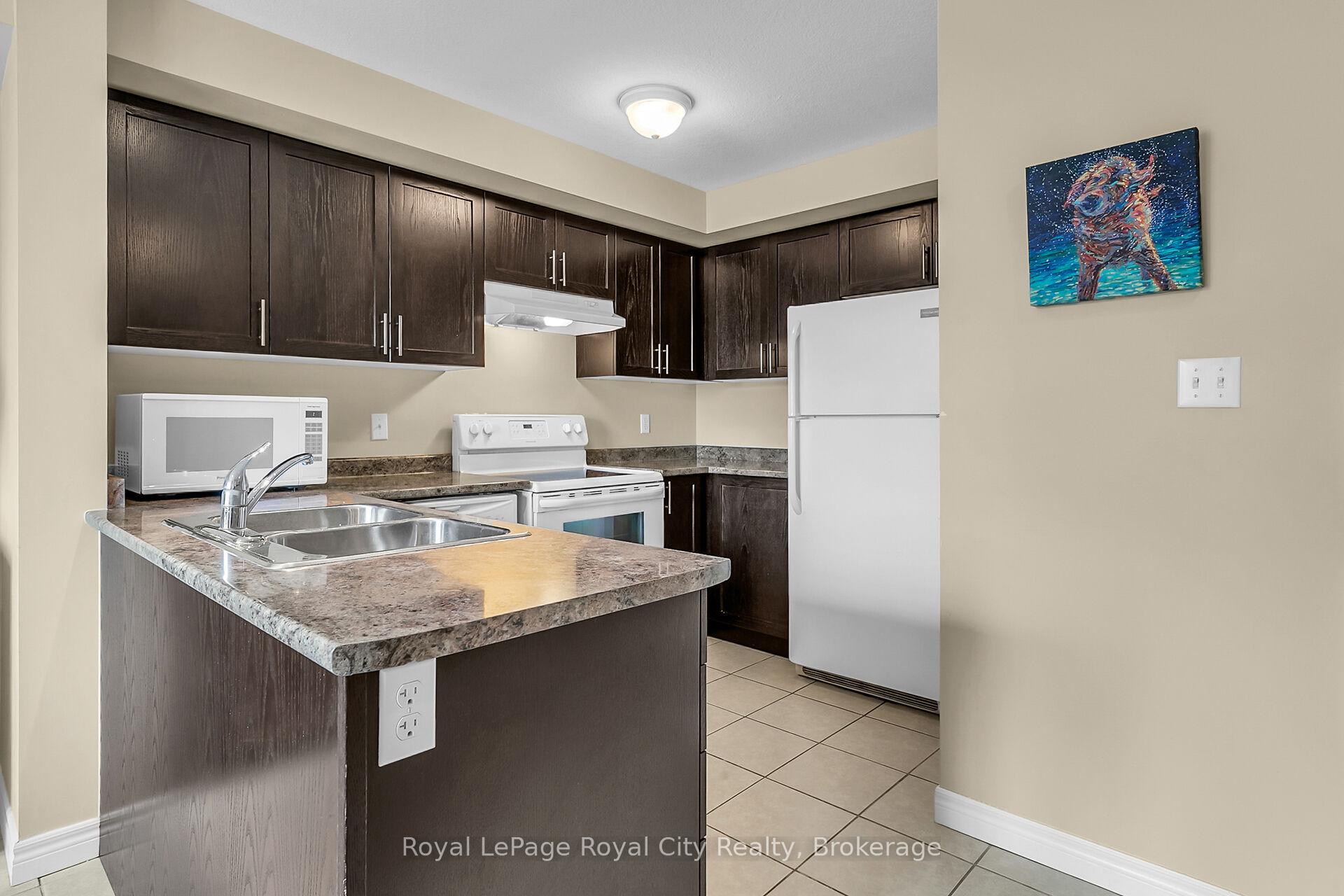 Photo 5 of Unit A, 616 Woodlawn Road, Guelph, Victoria North — HOMEH