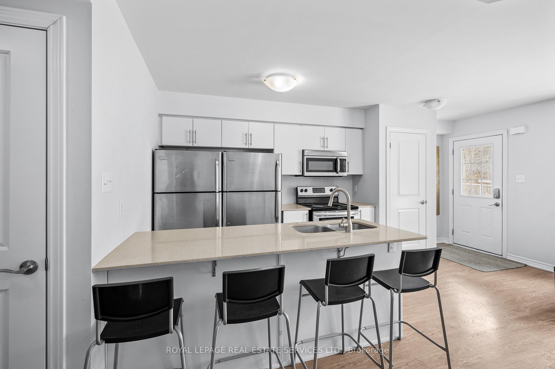 Photo 3 of Unit 12, 244 Penetanguishene Road, Barrie, Georgian Drive — HOMEH