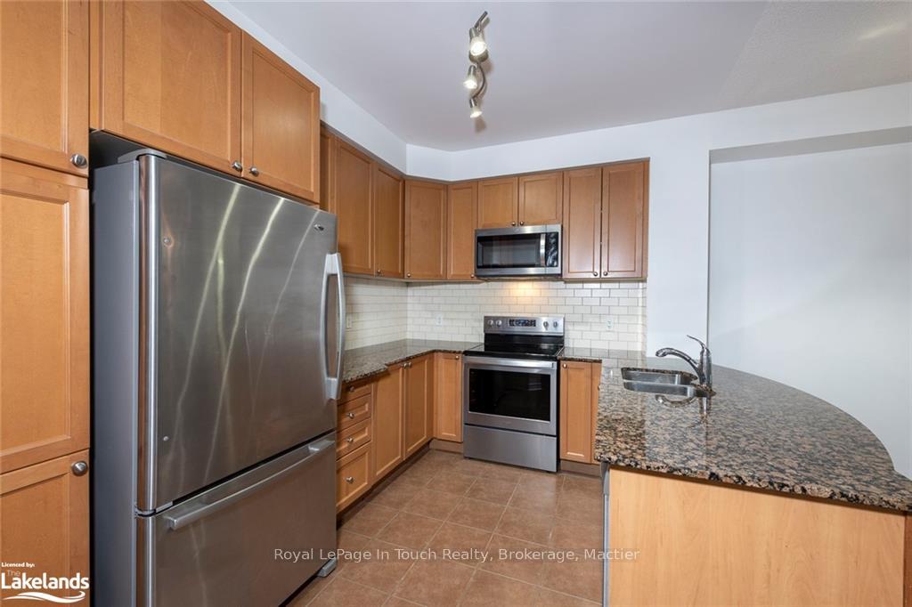 Photo 7 of Unit 702, 699 Aberdeen Boulevard, Midland — HOMEH
