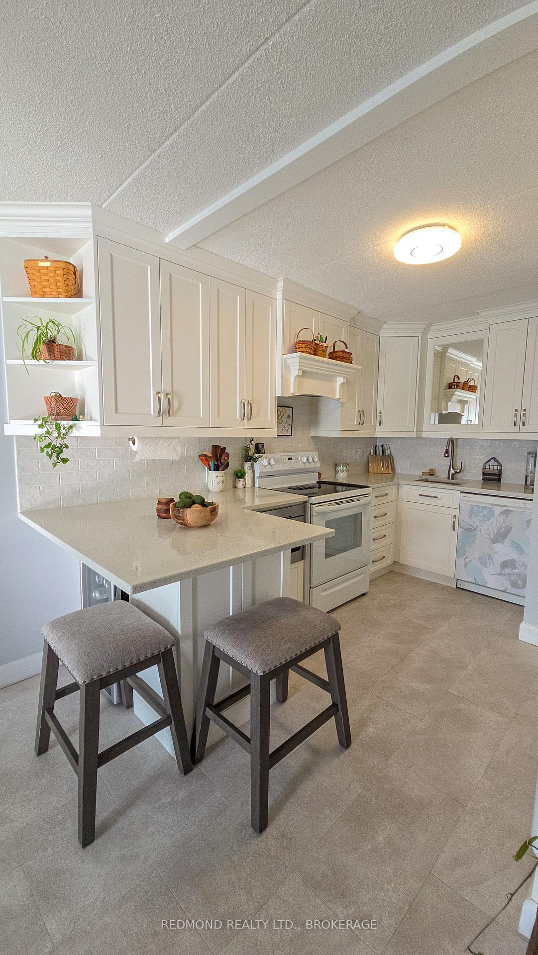 Photo 16 of Unit 304, 610 William Street S, Gananoque — HOMEH