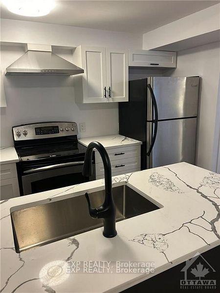 Photo 2 of Unit B, 1354 Louis Lane, Ottawa, Cyrville Rd./Industrial Park — HOMEH