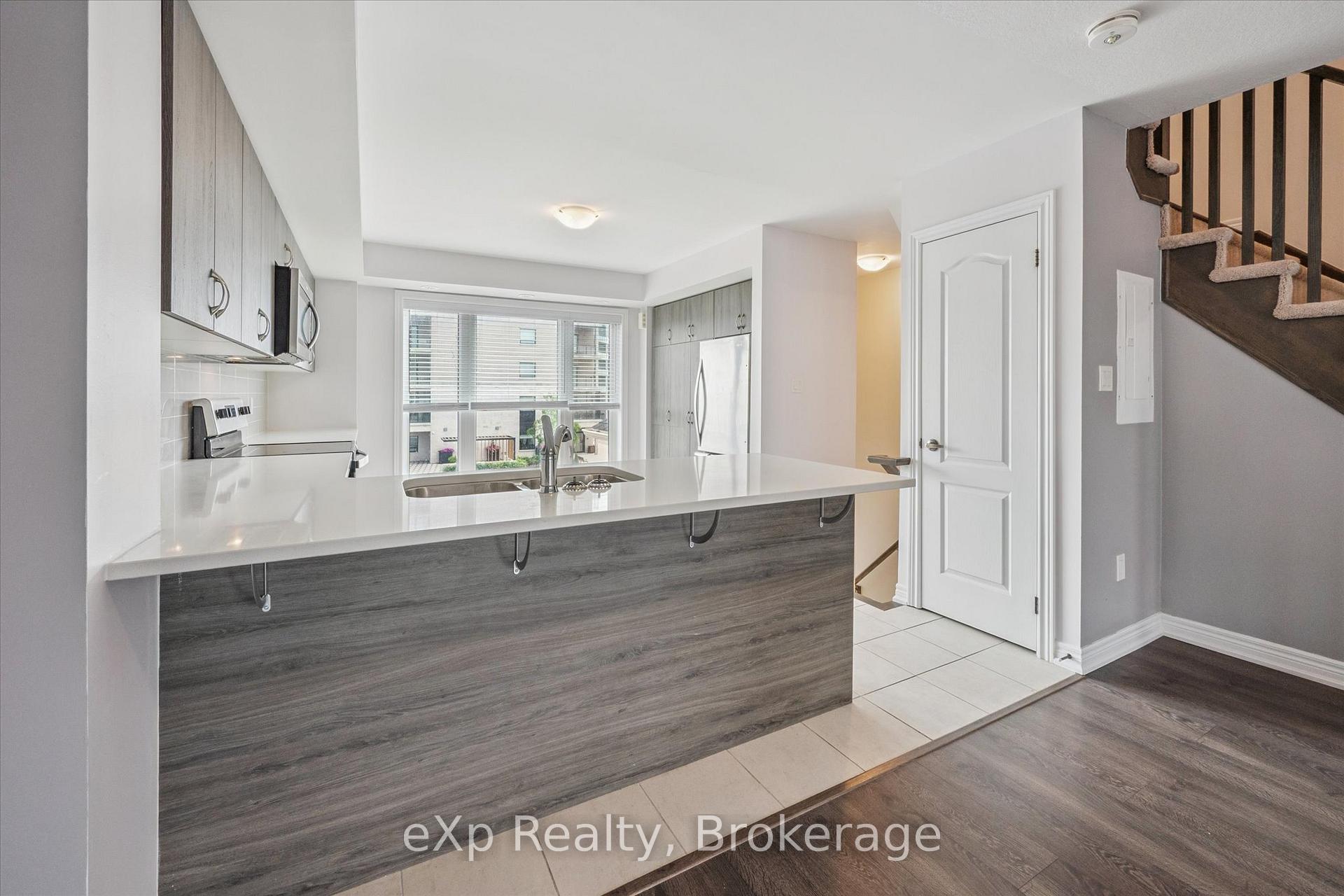 Photo 7 of Unit 4, 124 Watson Parkway N, Guelph, Grange Road — HOMEH