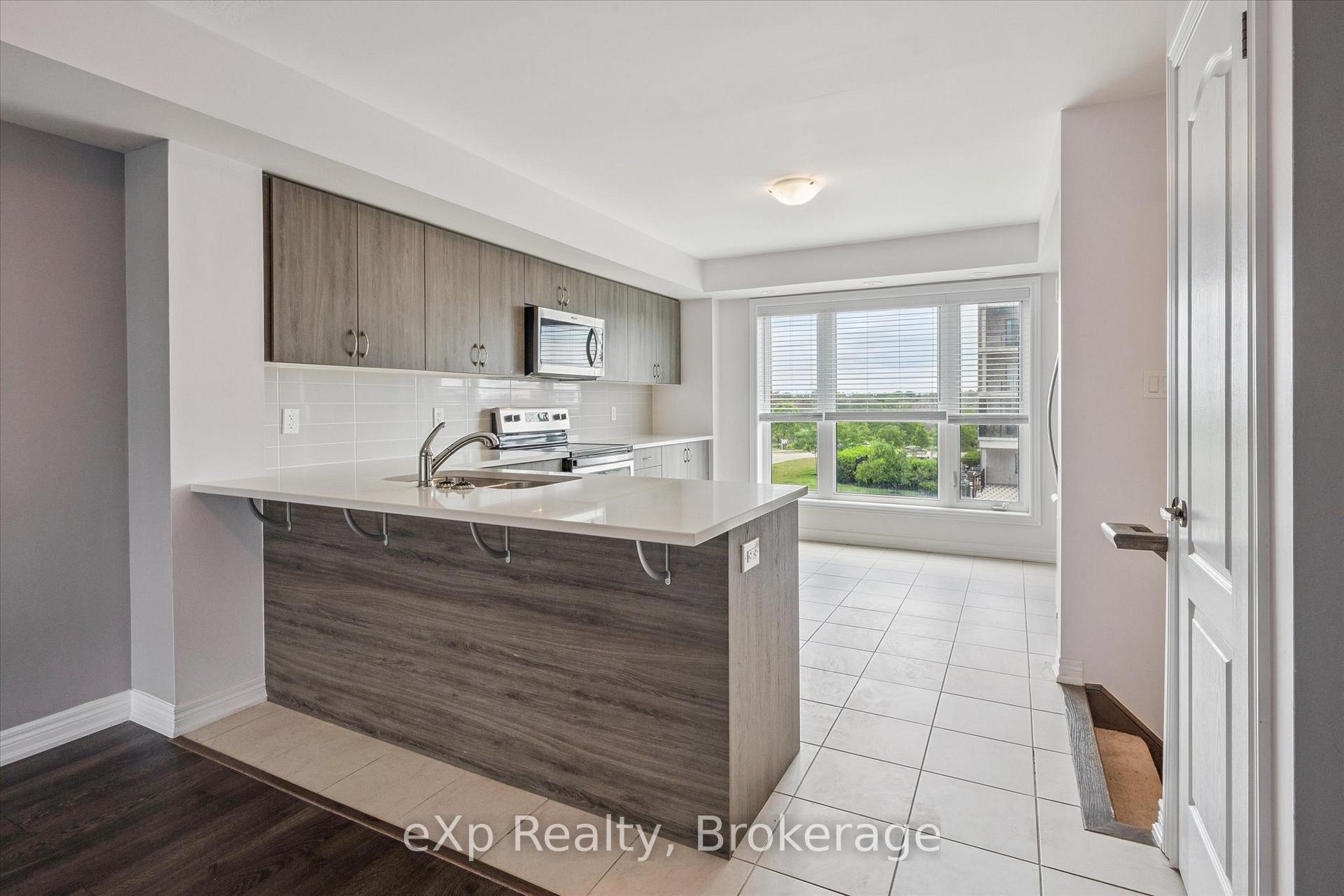 Photo 8 of Unit 4, 124 Watson Parkway N, Guelph, Grange Road — HOMEH